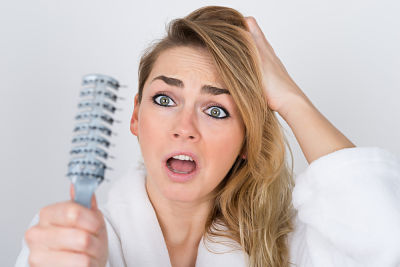 Mujer con Alopecia Androgenética